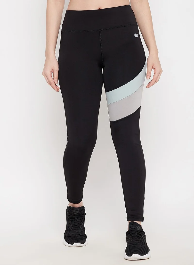 Clovia Black Snug Fit High-Rise Active Tights in Black for Women | Best Price UAE